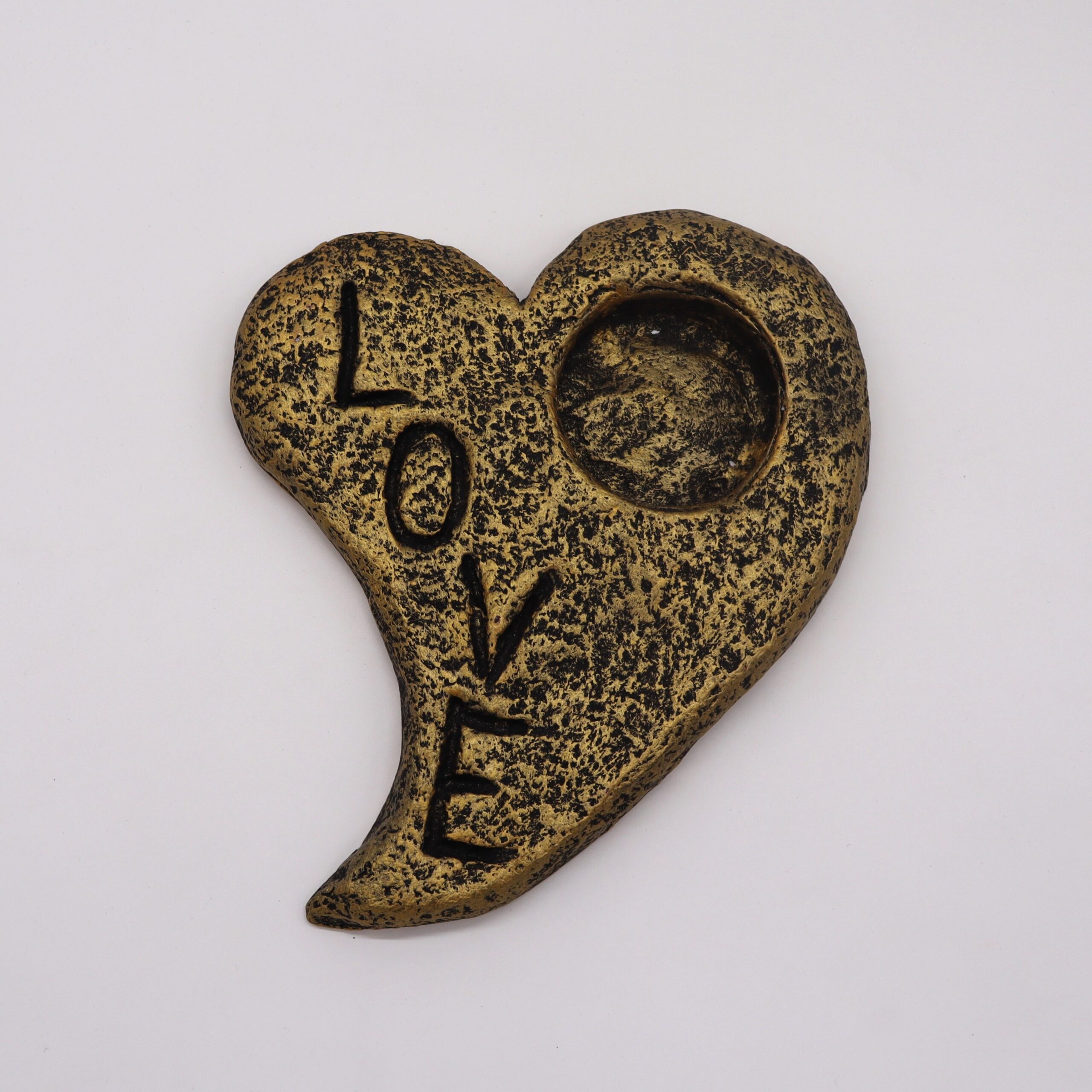 Heart-shaped candle holder